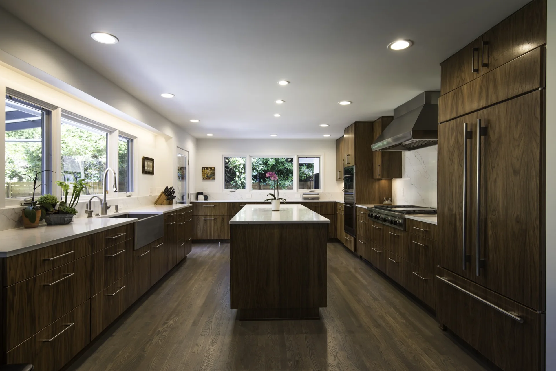 Real Yost full-room walnut kitchen cabinetry